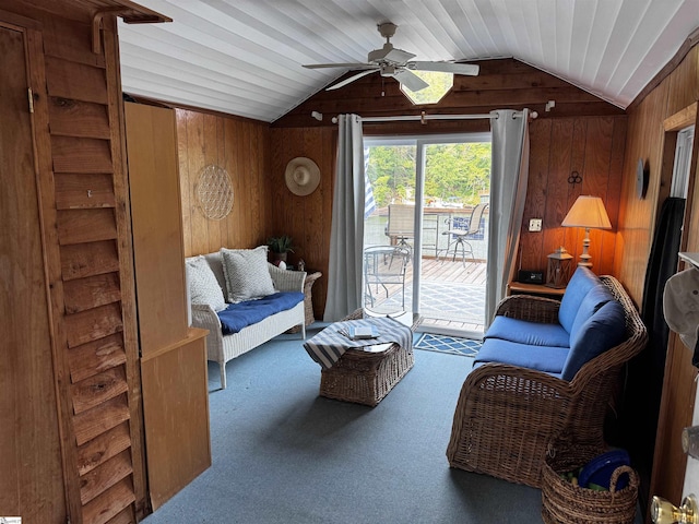 1700 W Lakeshore Dr Lot K, Landrum, SC 29356 - carpeted living room with wood walls, lofted ceiling, and ceiling fan