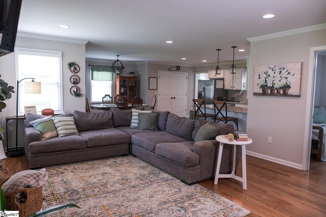 113 Hardy St, Williamston, SC 29697 - living area featuring ornamental molding, recessed lighting, wood finished floors, and baseboards