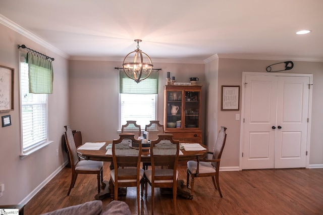 113 Hardy St, Williamston, SC 29697 - dining area with a chandelier, dark wood-style floors, baseboards, and ornamental molding