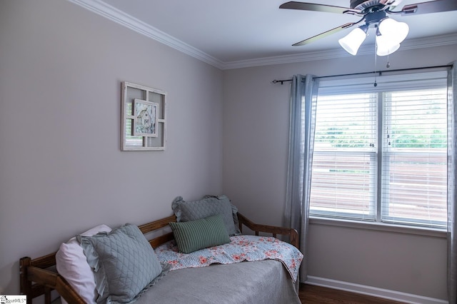 113 Hardy St, Williamston, SC 29697 - bedroom featuring multiple windows, ornamental molding, wood finished floors, a ceiling fan, and baseboards