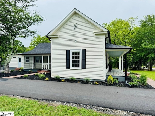 800 Holiday Dam Rd, Honea Path, SC 29654 - view of home's exterior featuring covered porch and roof with shingles