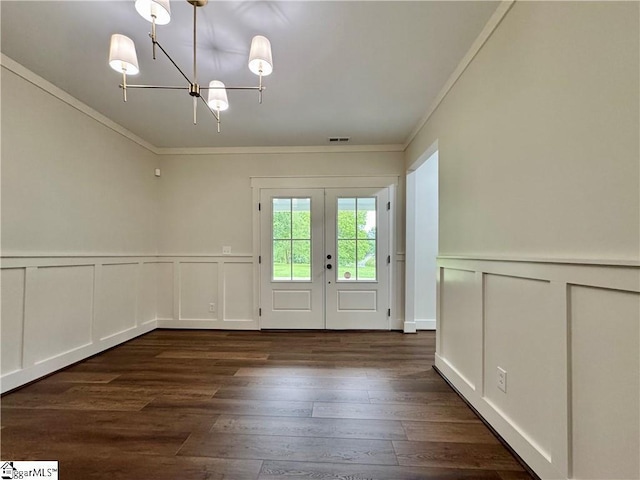 800 Holiday Dam Rd, Honea Path, SC 29654 - doorway to outside featuring a decorative wall, crown molding, dark wood finished floors, a chandelier, and wainscoting