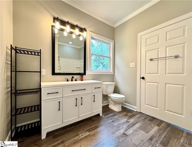 800 Holiday Dam Rd, Honea Path, SC 29654 - bathroom with ornamental molding, wood finished floors, vanity, toilet, and baseboards