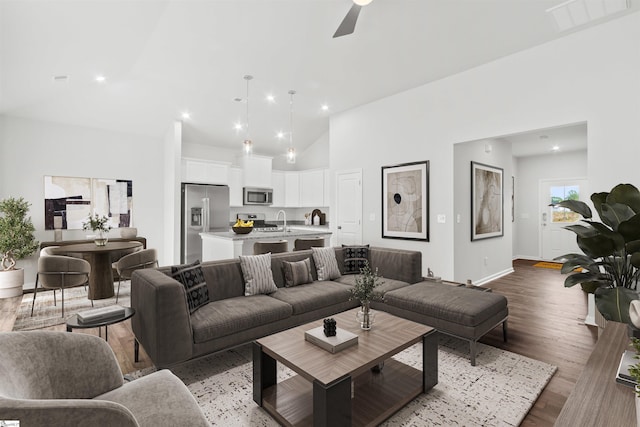 1142 Berry Patch Dr, Lyman, SC 29365 - living area with high vaulted ceiling, light wood-style flooring, recessed lighting, ceiling fan, and baseboards
