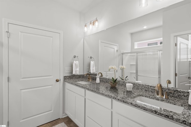 1142 Berry Patch Dr, Lyman, SC 29365 - full bath with double vanity, a shower stall, and tile patterned floors
