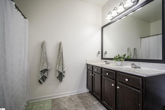350 Hartleigh Dr, Lyman, SC 29365 - bathroom with double vanity and baseboards