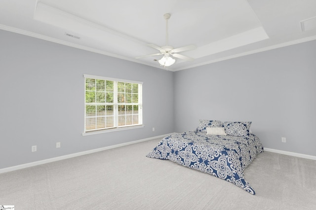 160 Spirit Mountain Ln, Easley, SC 29642 - carpeted bedroom featuring a tray ceiling, crown molding, baseboards, and a ceiling fan