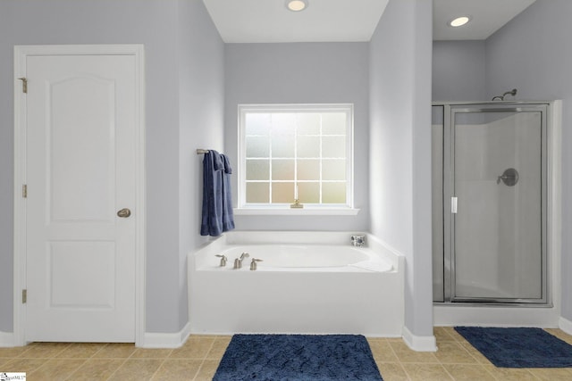160 Spirit Mountain Ln, Easley, SC 29642 - full bath featuring a stall shower, a bath, baseboards, and tile patterned flooring