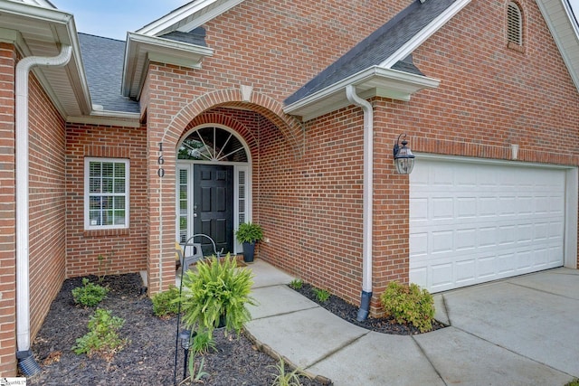160 Spirit Mountain Ln, Easley, SC 29642 - doorway to property with brick siding, a garage, a shingled roof, and concrete driveway