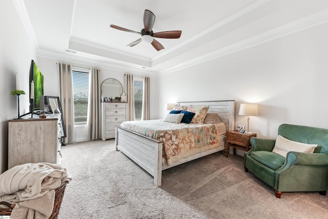 647 Fern Hollow Trl, Anderson, SC 29621 - bedroom with ornamental molding, light colored carpet, a tray ceiling, and a ceiling fan