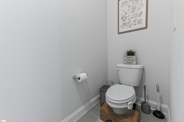 647 Fern Hollow Trl, Anderson, SC 29621 - bathroom featuring baseboards and toilet
