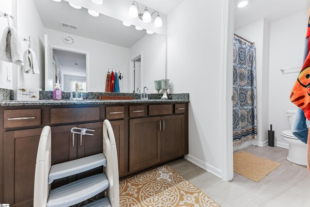 647 Fern Hollow Trl, Anderson, SC 29621 - bathroom with double vanity and toilet