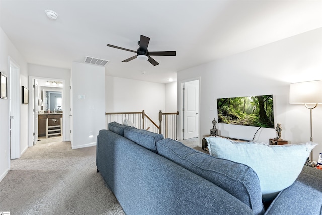 647 Fern Hollow Trl, Anderson, SC 29621 - living room featuring light colored carpet, baseboards, and a ceiling fan