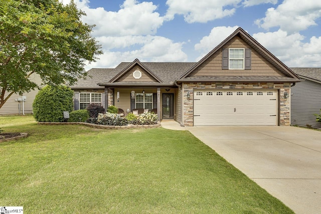 809 Dove Creek Ct, Boiling Springs, SC 29316 - view of front of house featuring driveway, a front yard, roof with shingles, and stone siding