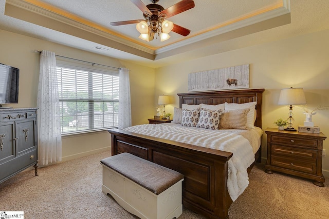 809 Dove Creek Ct, Boiling Springs, SC 29316 - bedroom with a tray ceiling, crown molding, light carpet, baseboards, and ceiling fan