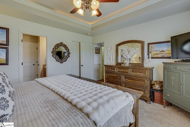 809 Dove Creek Ct, Boiling Springs, SC 29316 - bedroom featuring light carpet, ornamental molding, a tray ceiling, and a ceiling fan