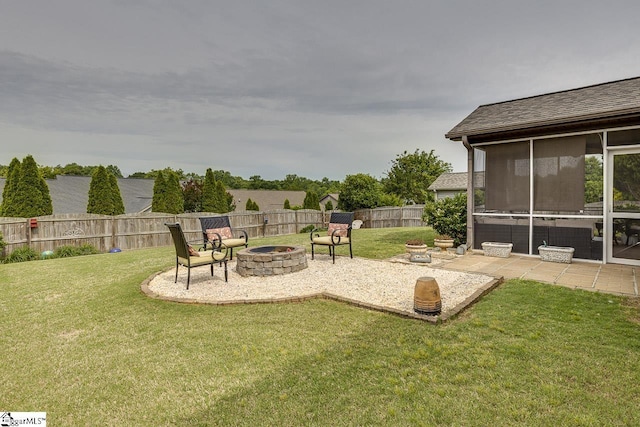 809 Dove Creek Ct, Boiling Springs, SC 29316 - view of yard featuring a fire pit, a sunroom, and a patio