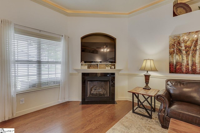 809 Dove Creek Ct, Boiling Springs, SC 29316 - living area featuring wood finished floors, a tile fireplace, crown molding, and baseboards