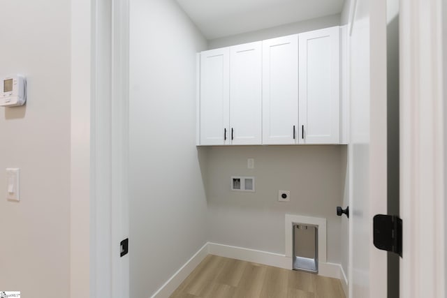 168 Dunbar St, Wellford, SC 29385 - washroom with cabinet space, hookup for an electric dryer, hookup for a washing machine, light wood-style floors, and baseboards