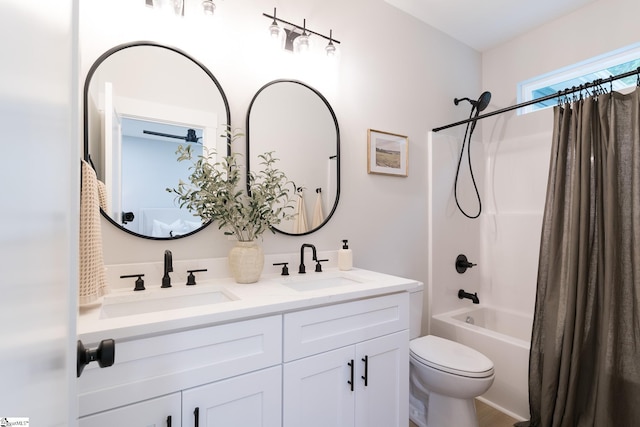 168 Dunbar St, Wellford, SC 29385 - bathroom with double vanity, toilet, and shower / bathtub combination with curtain