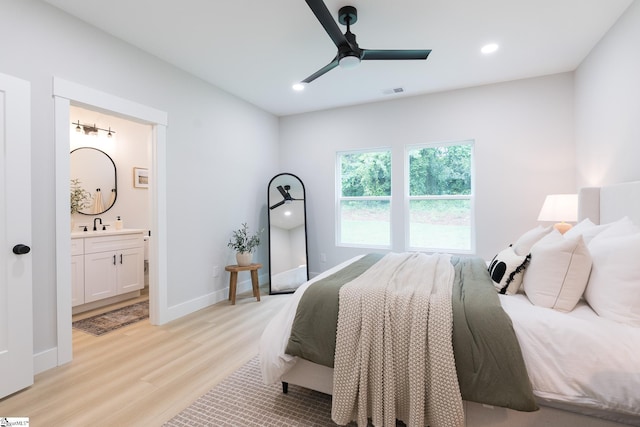 168 Dunbar St, Wellford, SC 29385 - bedroom featuring light wood-style flooring, recessed lighting, ensuite bath, ceiling fan, and baseboards