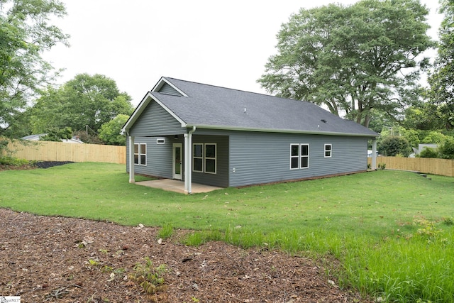 168 Dunbar St, Wellford, SC 29385 - back of property with a patio and a shingled roof