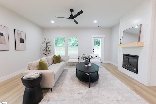 168 Dunbar St, Wellford, SC 29385 - living room featuring light wood-style flooring, ceiling fan, a fireplace, recessed lighting, and baseboards