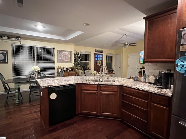 20 Hawkcrest Ct, Travelers Rest, SC 29690 - kitchen featuring dishwasher, a sink, dark wood-style floors, a peninsula, and light stone countertops