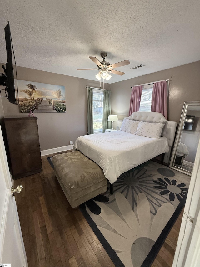 405 Perry Rd, Greenville, SC 29609 - bedroom with a textured ceiling, wood finished floors, ceiling fan, and baseboards