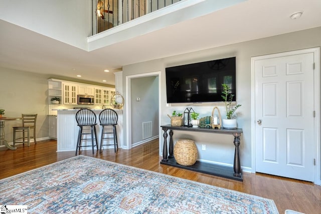 182 Roundstone Dr, Inman, SC 29349 - living area with wood finished floors, baseboards, and recessed lighting