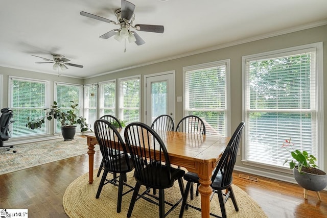 182 Roundstone Dr, Inman, SC 29349 - dining space featuring wood finished floors, ceiling fan, and ornamental molding