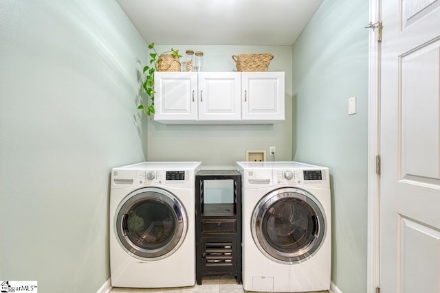 182 Roundstone Dr, Inman, SC 29349 - washroom featuring washer and clothes dryer, baseboards, and cabinet space
