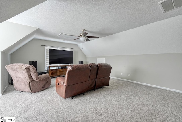 182 Roundstone Dr, Inman, SC 29349 - carpeted home theater featuring a ceiling fan, lofted ceiling, baseboards, and a textured ceiling