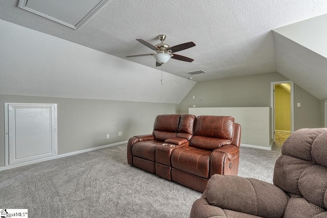 182 Roundstone Dr, Inman, SC 29349 - carpeted home theater room with ceiling fan, lofted ceiling, baseboards, and a textured ceiling