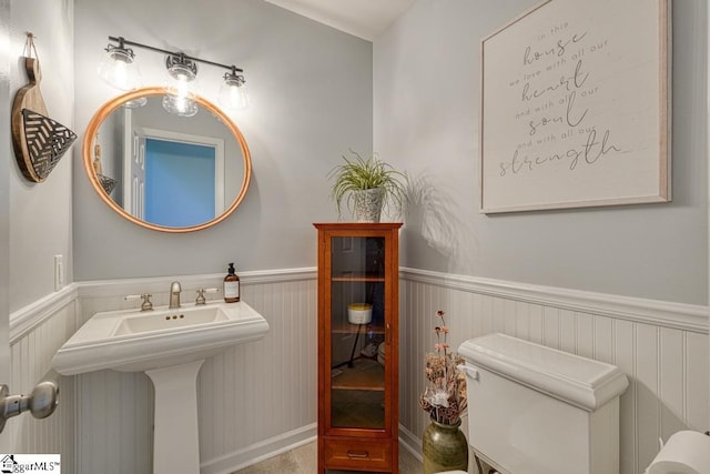 182 Roundstone Dr, Inman, SC 29349 - bathroom featuring toilet and a wainscoted wall