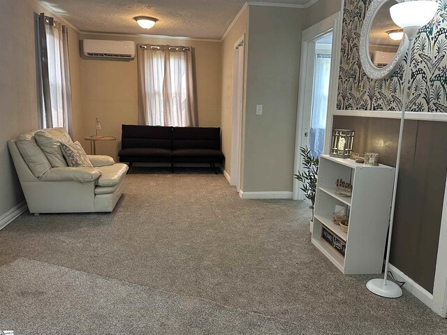 71 2nd St, Laurens, SC 29360 - living area featuring a wall mounted AC, carpet flooring, ornamental molding, baseboards, and a textured ceiling