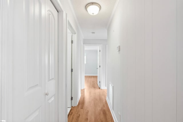 209 Boyd Ave, Simpsonville, SC 29681 - corridor with light wood-style flooring, ornamental molding, and baseboards