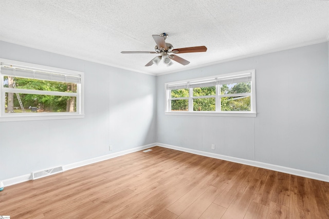 209 Boyd Ave, Simpsonville, SC 29681 - unfurnished room featuring ceiling fan, light wood-style flooring, a textured ceiling, and baseboards