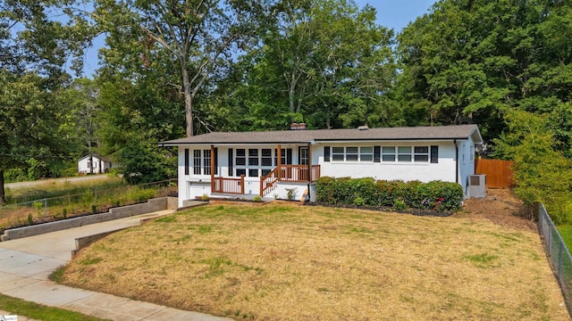 209 Boyd Ave, Simpsonville, SC 29681 - ranch-style house with concrete driveway, cooling unit, an attached garage, and covered porch