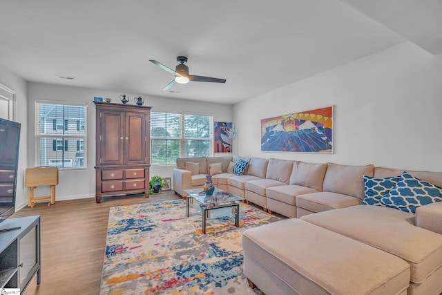 108 Sproles Ln, Easley, SC 29642 - living area with wood finished floors, a ceiling fan, and baseboards