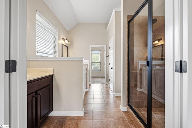 135 Adams Creek Pl, Simpsonville, SC 29681 - full bathroom with vanity, french doors, a stall shower, lofted ceiling, and baseboards