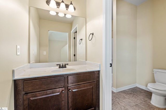 135 Adams Creek Pl, Simpsonville, SC 29681 - bathroom featuring toilet, vanity, and baseboards