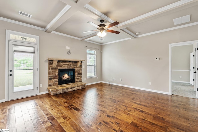 135 Adams Creek Pl, Simpsonville, SC 29681 - unfurnished living room with hardwood / wood-style floors, a ceiling fan, a stone fireplace, beam ceiling, and baseboards