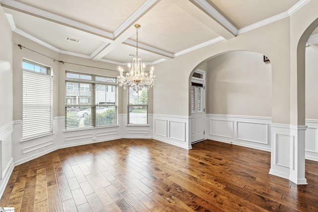 135 Adams Creek Pl, Simpsonville, SC 29681 - unfurnished dining area featuring plenty of natural light, dark wood-style floors, arched walkways, beam ceiling, and a wainscoted wall