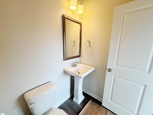 209 Islay Way, Anderson, SC 29621 - bathroom with toilet, baseboards, wood finished floors, and a sink