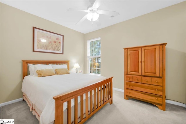 415 Plamondon Dr, Simpsonville, SC 29680 - bedroom with light carpet, baseboards, and a ceiling fan