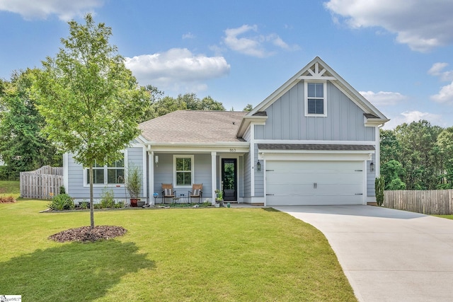 863 Orchard Valley Ln, Boiling Springs, SC 29316 - view of front facade with board and batten siding, driveway, a porch, an attached garage, and roof with shingles