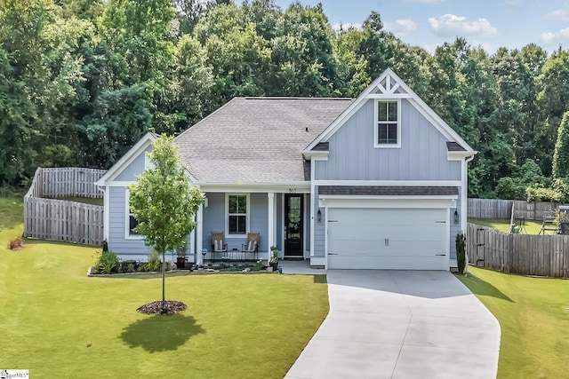 863 Orchard Valley Ln, Boiling Springs, SC 29316 - view of front of property with a porch, board and batten siding, driveway, and roof with shingles