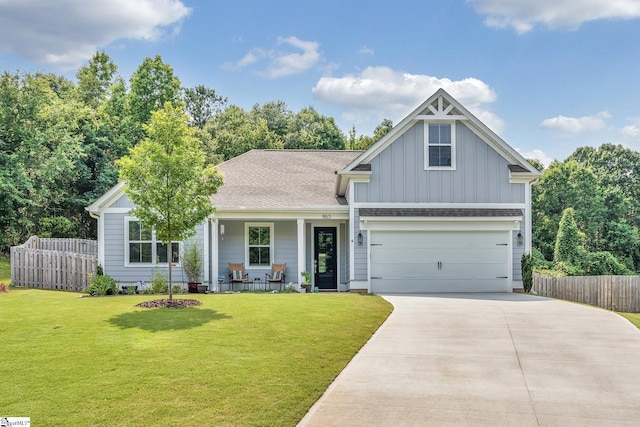863 Orchard Valley Ln, Boiling Springs, SC 29316 - view of front of house with board and batten siding, driveway, a porch, roof with shingles, and a garage