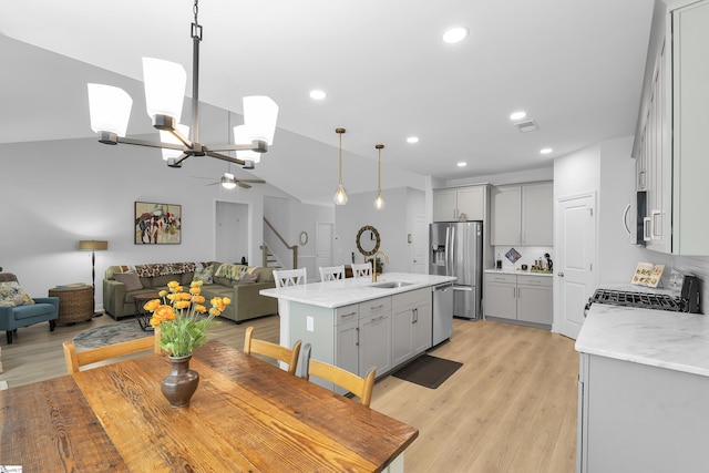 863 Orchard Valley Ln, Boiling Springs, SC 29316 - dining space with stairs, recessed lighting, light wood-style flooring, ceiling fan, and a chandelier